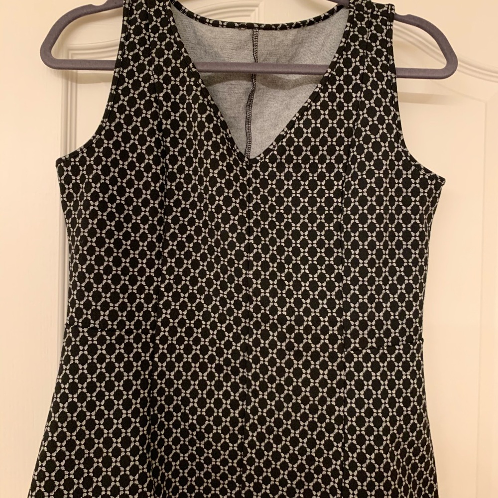 Peplum style sleeveless top